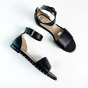 VALENTINO Black Flat Rockstud City Soul Sandal Size 39.5 US 9.5 Ankle Strap